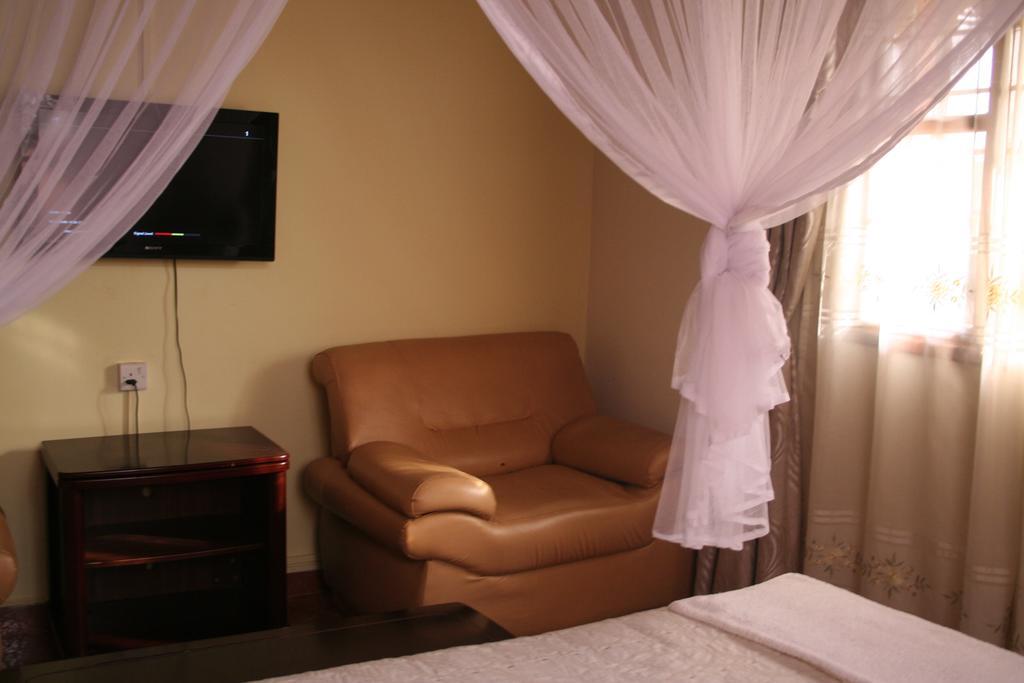 Hotel Acacia Kampala Szoba fotó